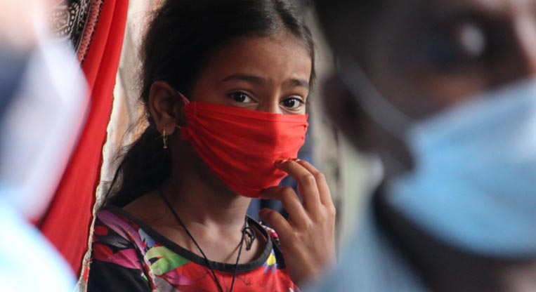 A child in a mask