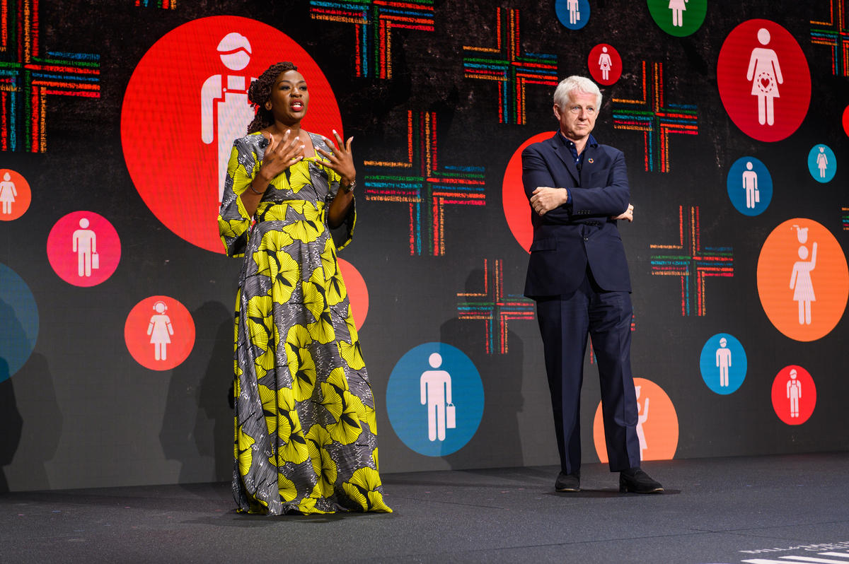 Scheaffer Okore and Richard Curtis speak at Goalkeepers 2019. ©Gates Archive/Mike Lawrence