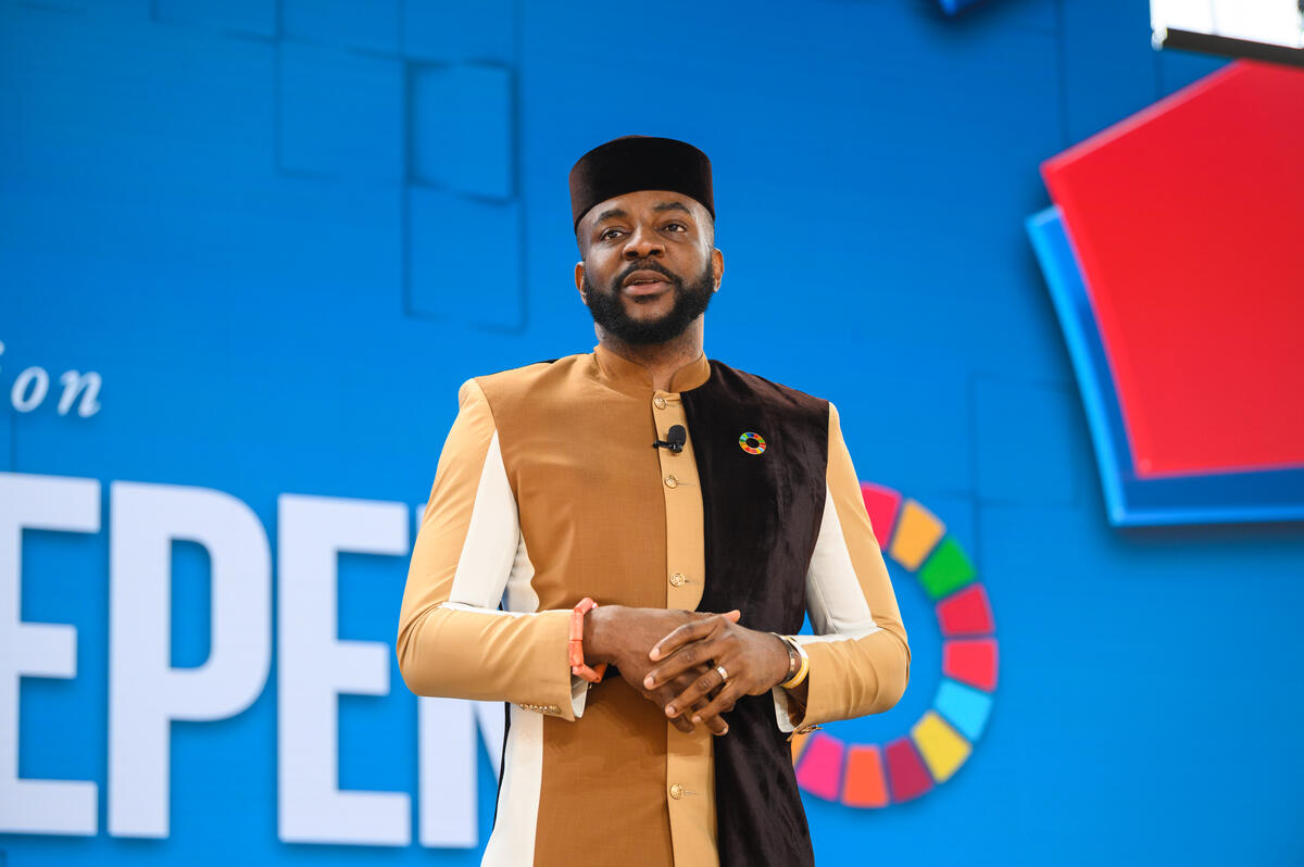 Ebuka Obi-Uchendu speaks onstage during Goalkeepers 2022. ©Gates Archive/Mike Lawrence