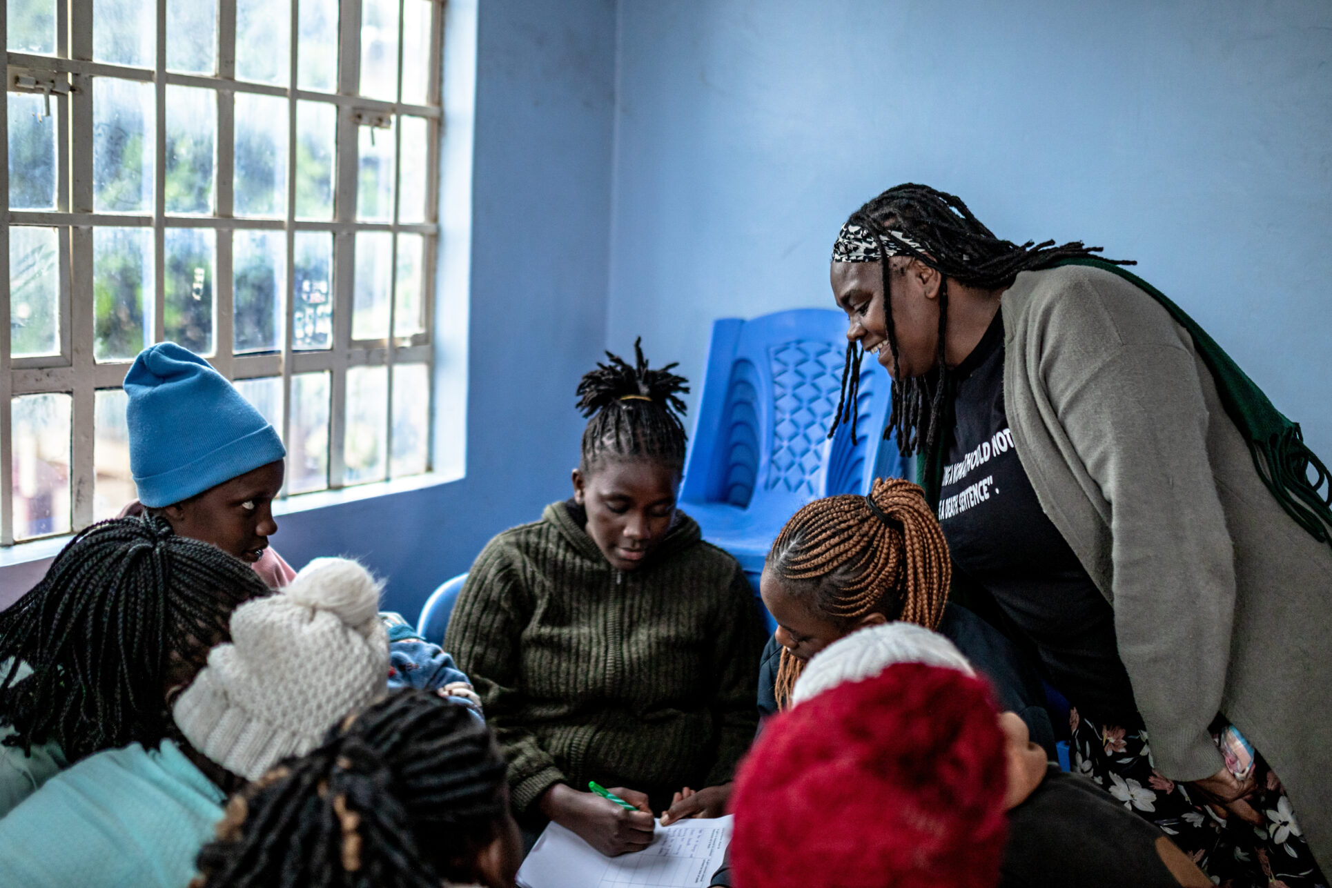 Josephine Barasa, 48, a community health worker, mentor to young women, and advocate against gender-based violence (GBV), leads a SRHR workshop for young girls in Kangemi, Nairobi county, on 9 August 2025.