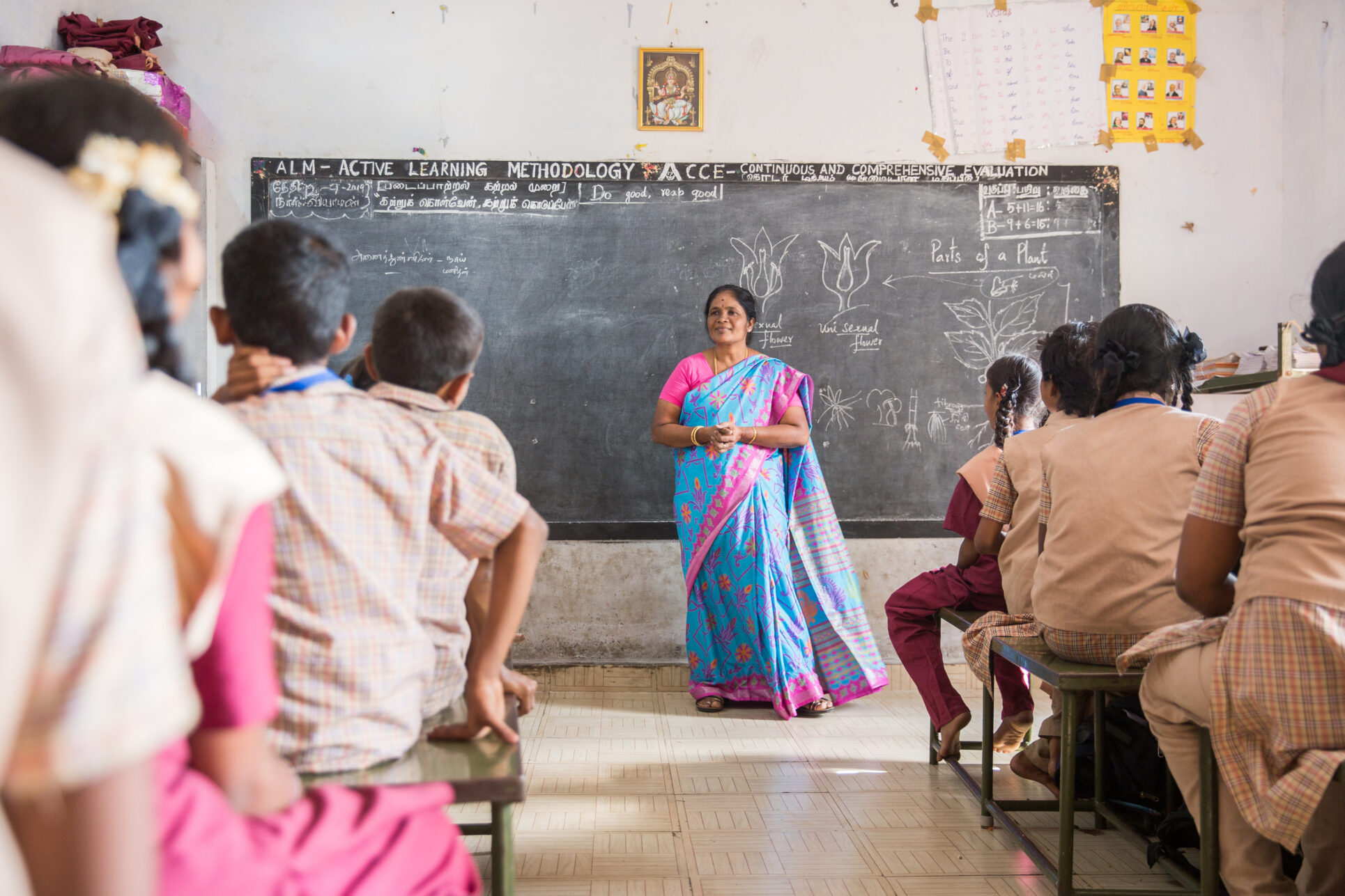 A teacher conducts a lesson in the classroom of a municipal middle school in Ambedkar Nagar, Vellore, India.